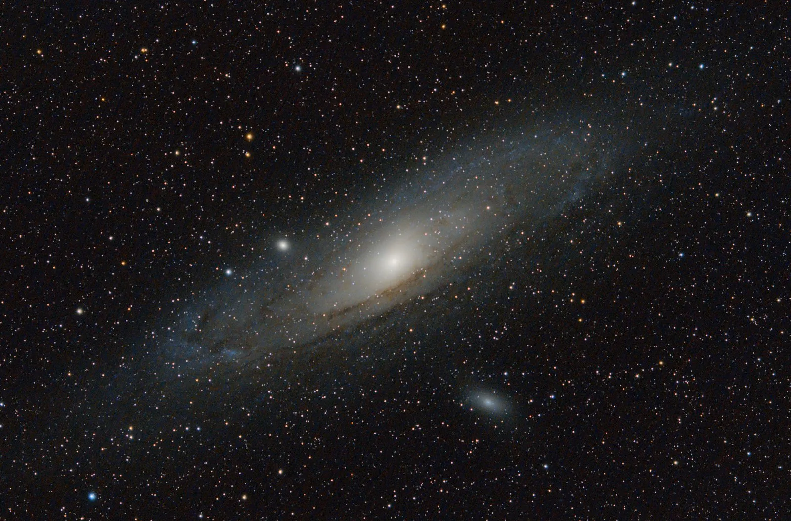 The Andromeda Galaxy after AstroBake, showing dust lanes and companion galaxies